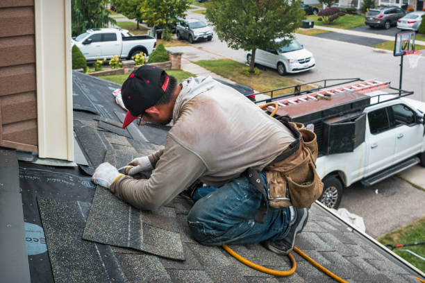 Professional Roofing technician working in Rogers, CT